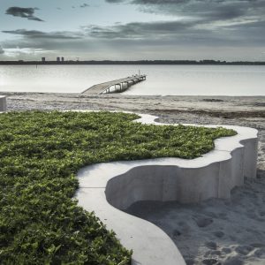 A 50cm barrier along any beach can radically change natural dynamics, sometimes for the better, sometimes for the worse. In the case of Hvidovre beach, the grassy area is a former landfill so this simple element is solving a number of problems whilst opening new uses. VEGA collaborated with Karin Lorentzen, a super-interesting Danish artist that designed the concrete wall. The result is an interesting and playful landscape element and I'm reminded of the Catherine Mosbach's approach to form-finding - a little bit. Smuk!